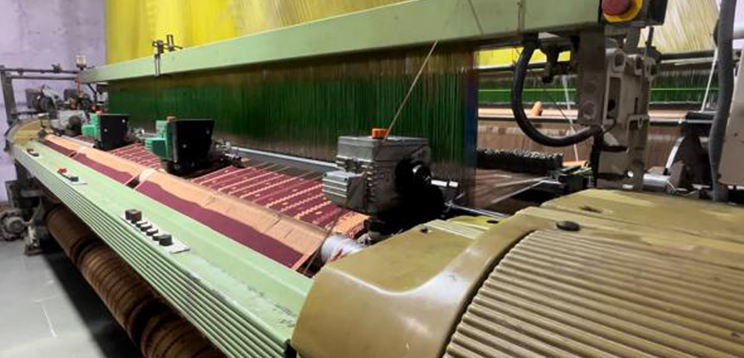 Textile weaving machine at Sanjog Textile Mills